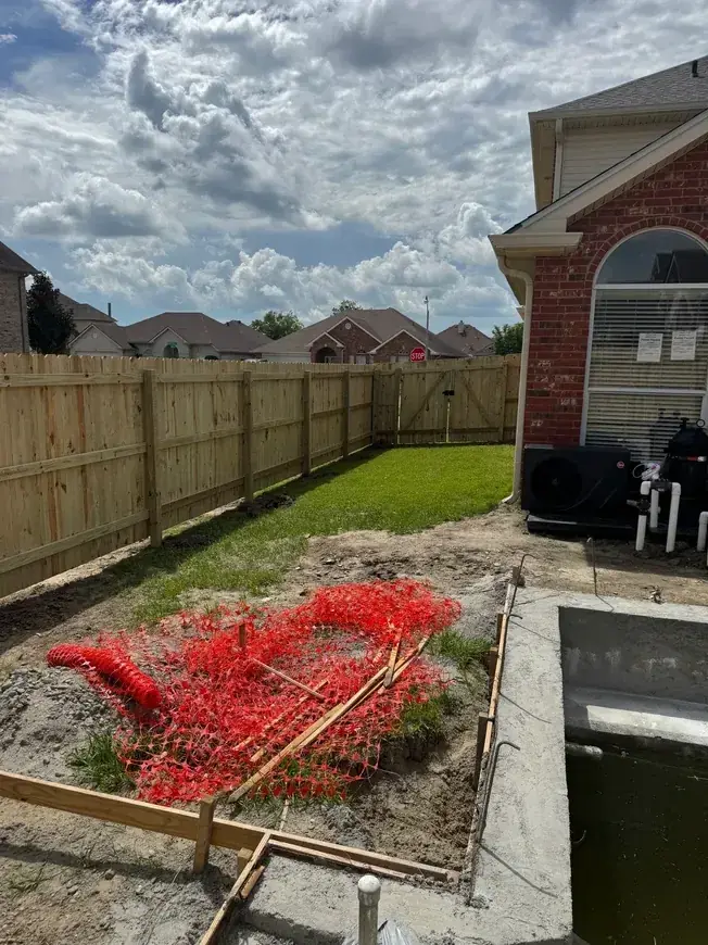 Backyard before fencing, site prep stage