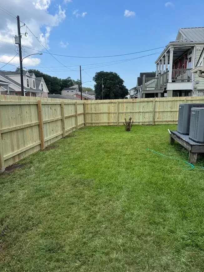 Finished fence and lawn after completion